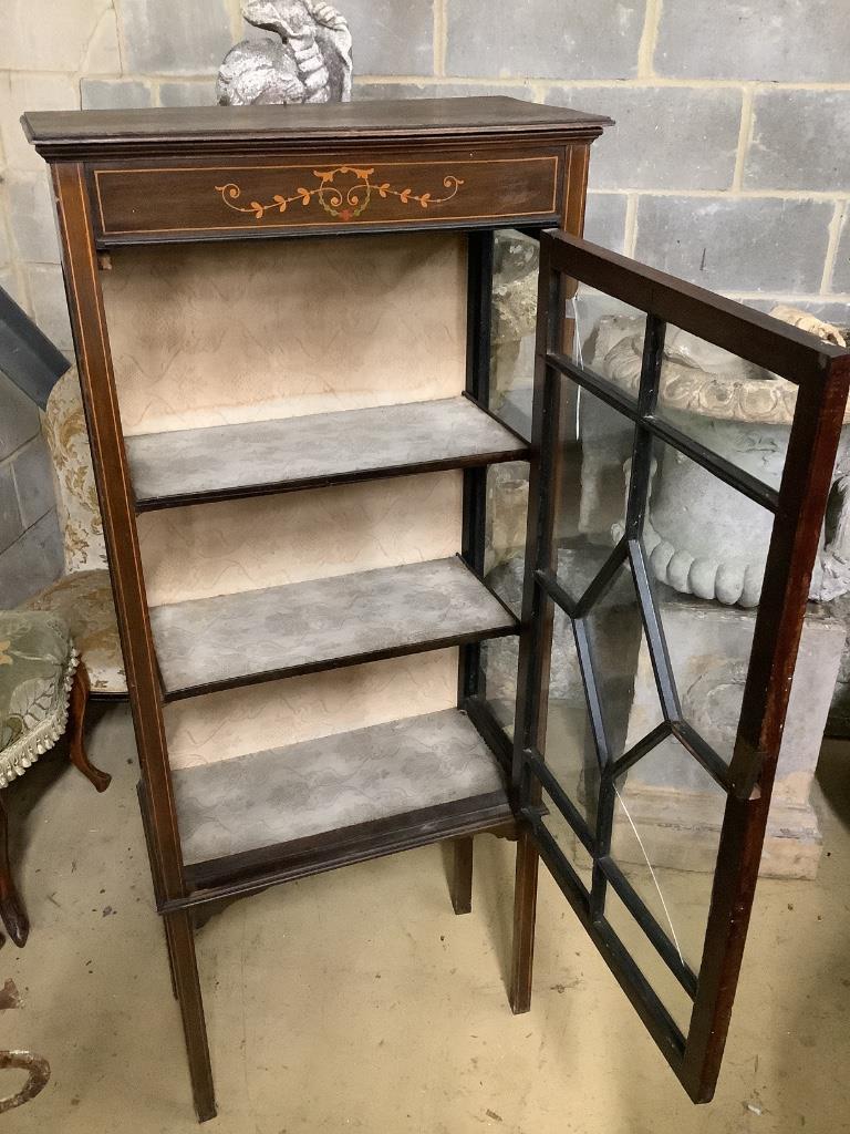 An Edwardian stencil decorated mahogany display cabinet, width 59cm, depth 29cm, height 141cm